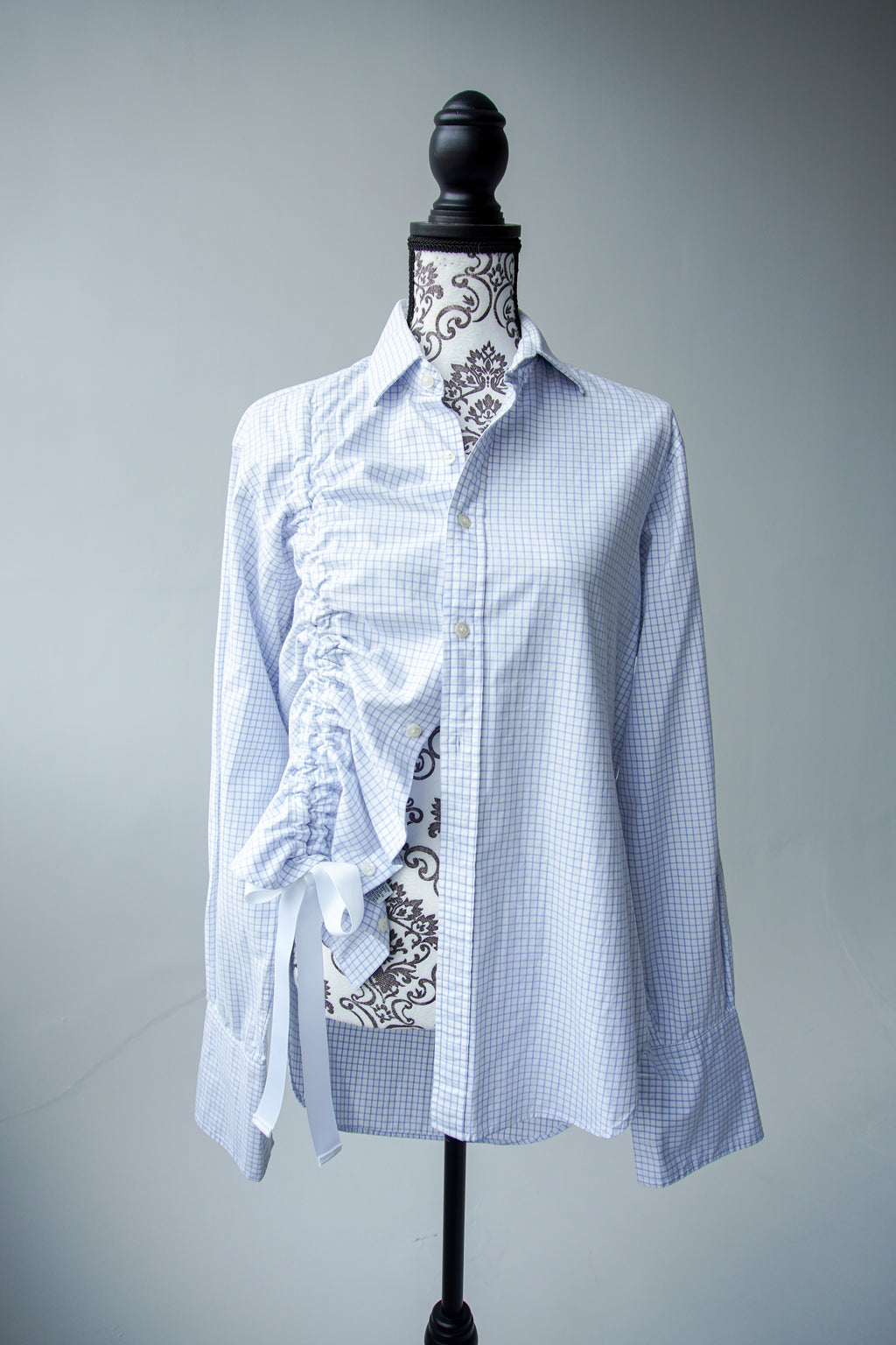Blue shirt with asymmetrical drawstring