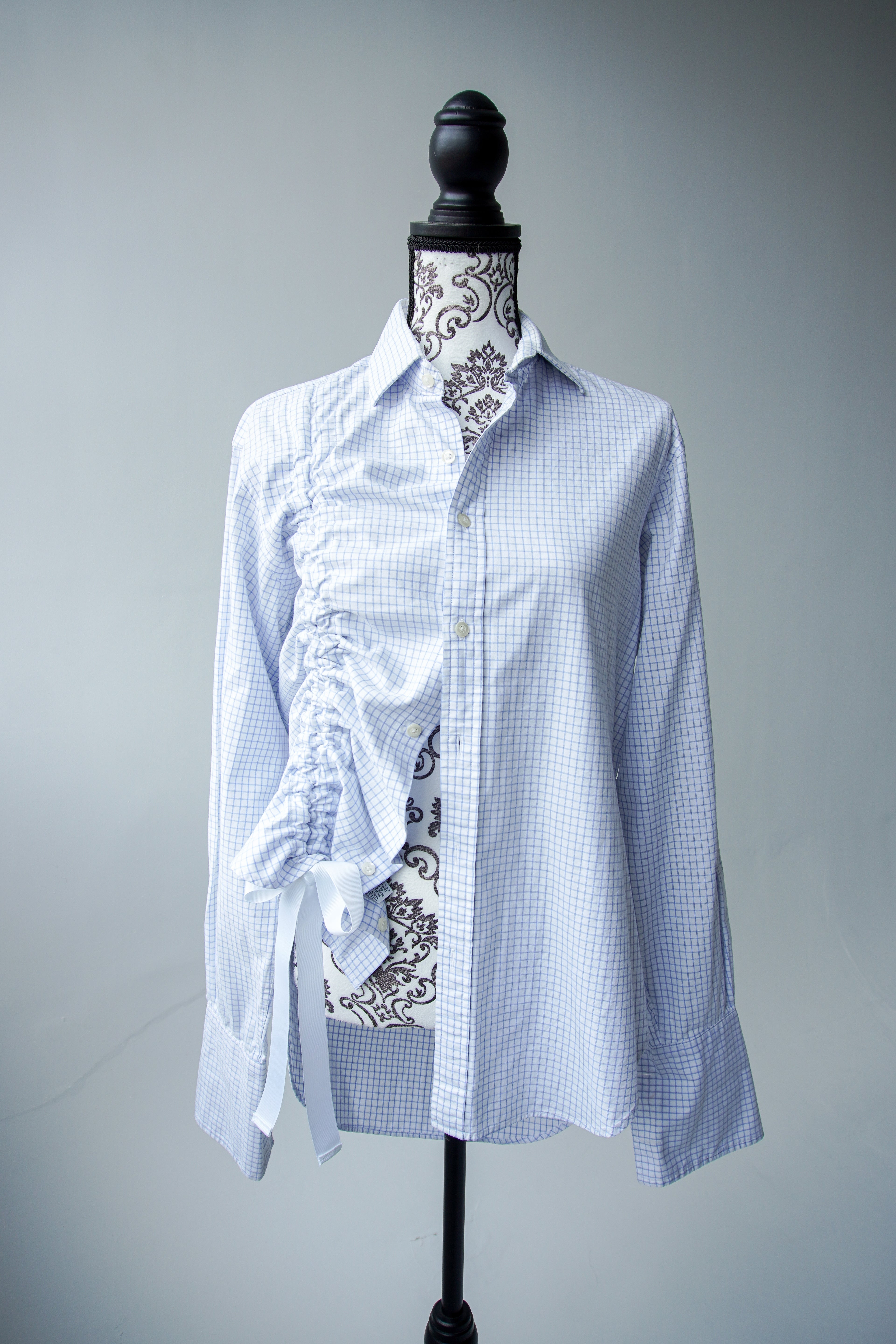 Blue shirt with asymmetrical drawstring