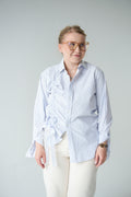 Blue shirt with asymmetrical drawstring